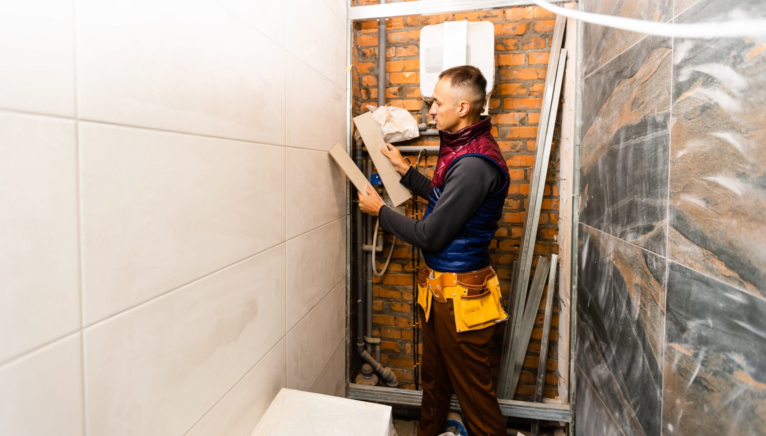industrial tiler builder worker installing floor t 2022 11 03 09 14 13 utc min scaled